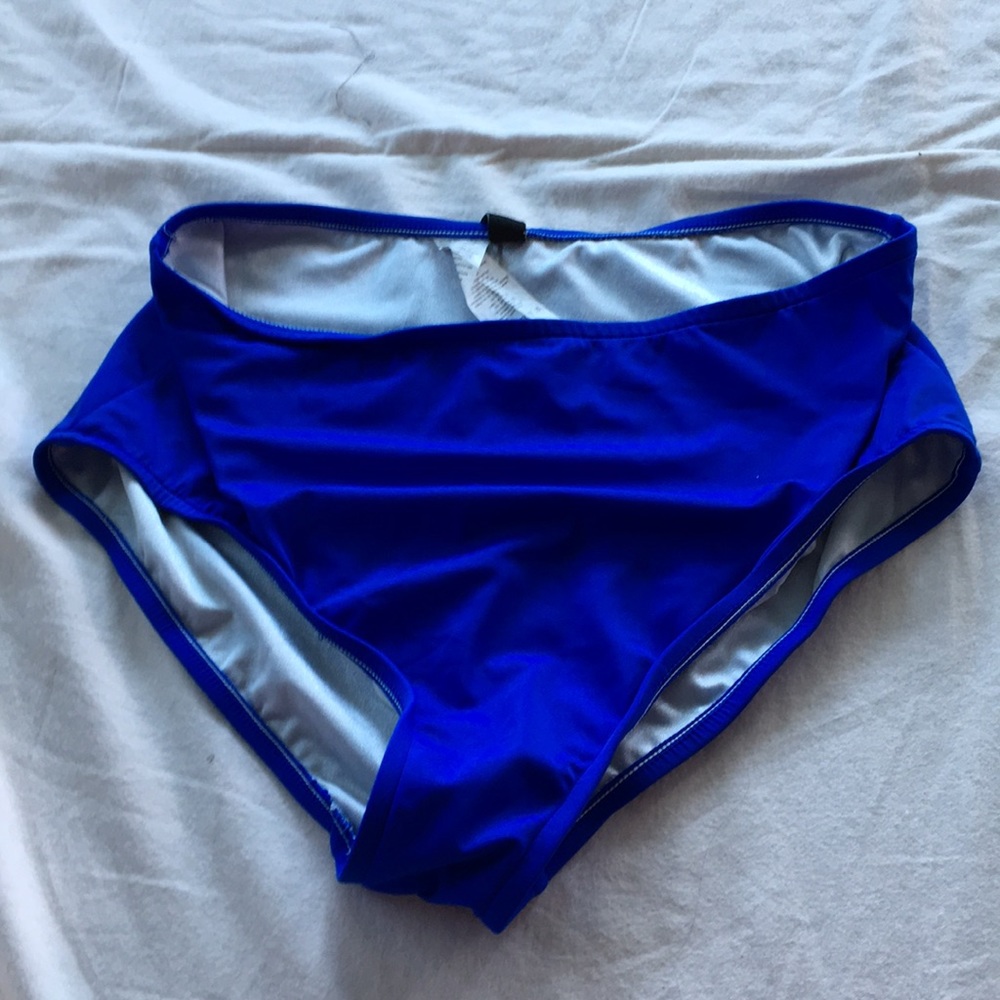 Woman’s blue bathing suit bottoms